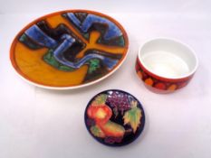 Two pieces of Poole pottery together with a Country Artist's fruit patterned pin dish.