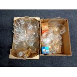 Two boxes of glass ware to include ship's decanter, drinking glasses,