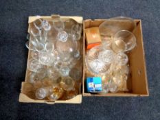 Two boxes of glass ware to include ship's decanter, drinking glasses,