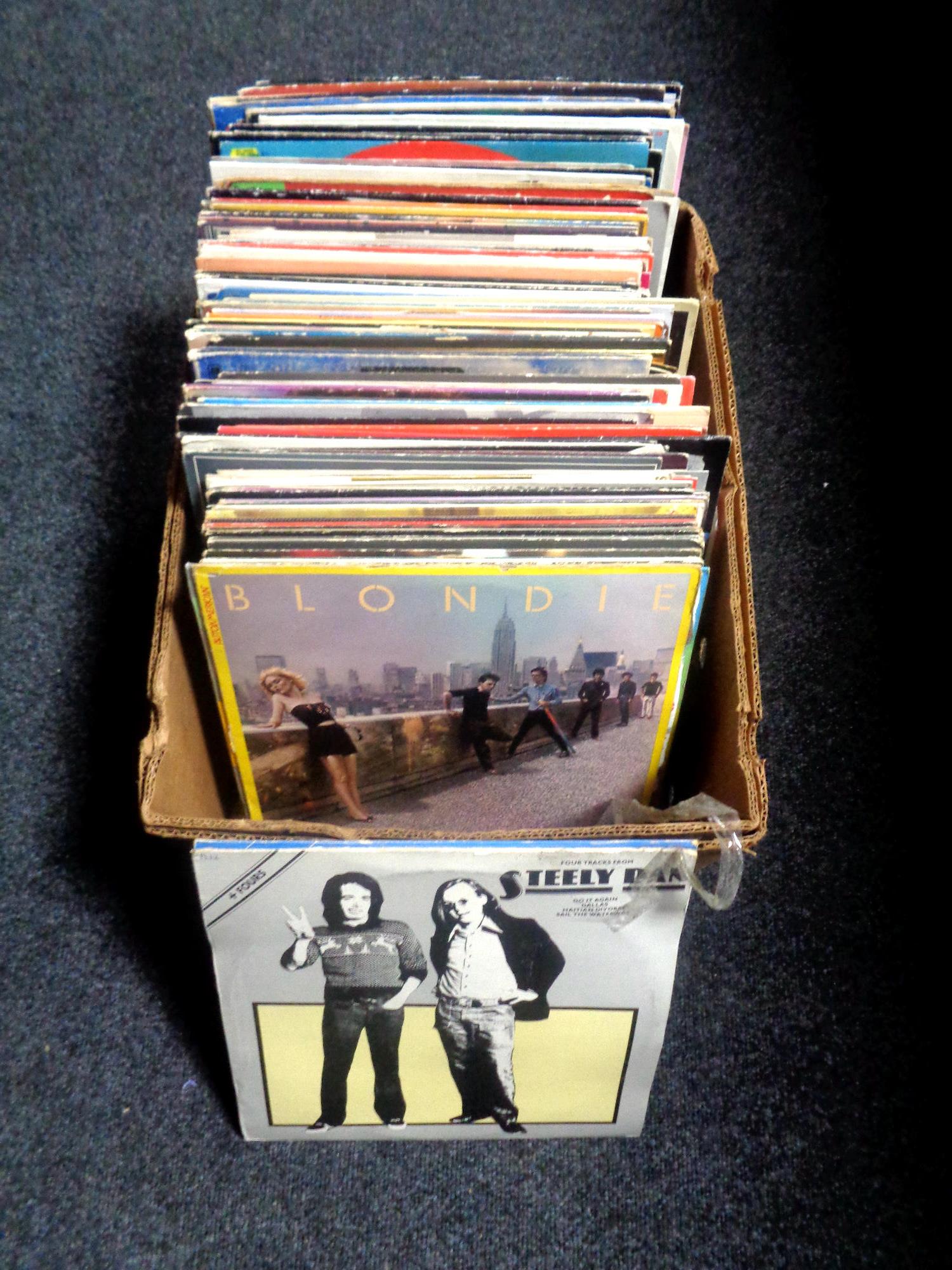 A box of vinyl LP's and 12" singles, Blondie, Rod Stewart, Spandau Ballet,