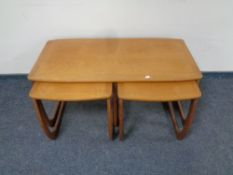 A nest of three 20th century Nathan teak tables.