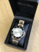 A gent's stainless steel Gianni Ricci quartz calendar wristwatch, boxed.