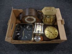 A box containing 20th century mantel and wall clocks including an oak cased Smiths Enfield mantel