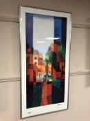 After Tom Schulten : A colour print depicting buildings, 39 x 79 cm, framed.