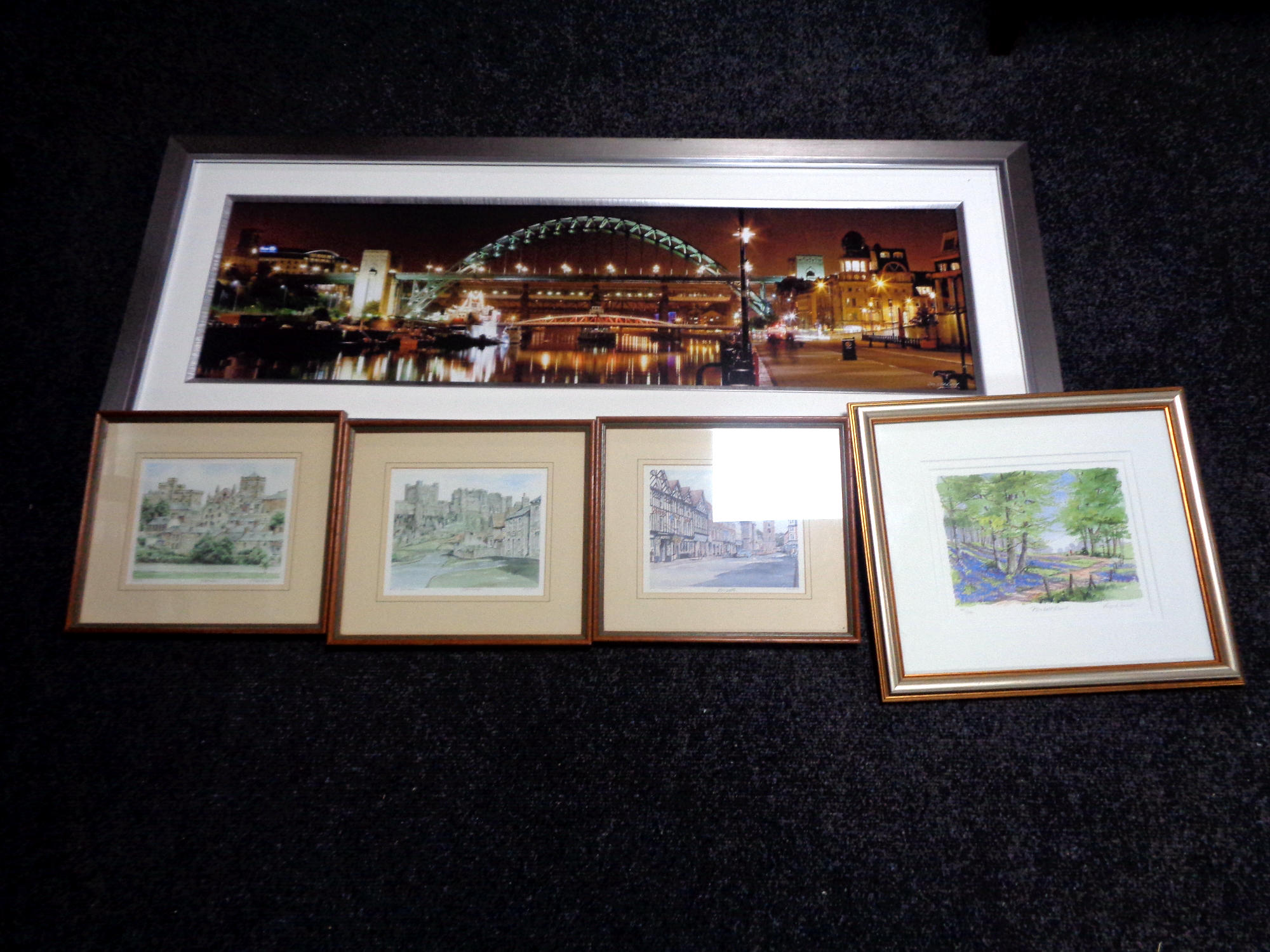 A contemporary framed print, Newcastle Quayside at nighttime,