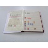 A stamp dealing album - GB Definitives, mixed quality used, lightly hinged mint and mint stamps.