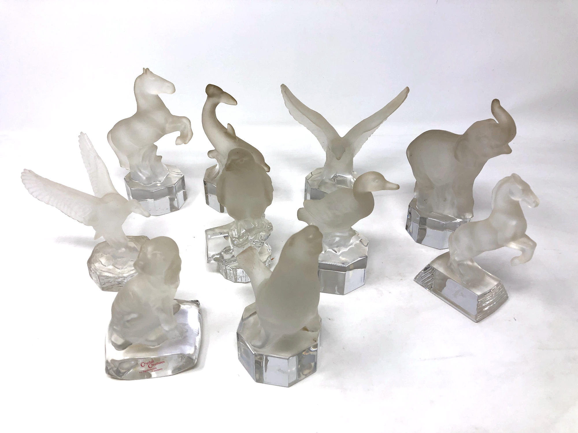 Ten Nachtmann crystal animal paperweights.