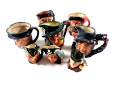 Eight small Royal Doulton character jugs to include Pied Piper, Rip Van Winkle, Falstaff,