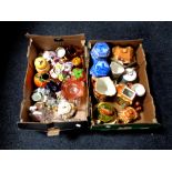 Two boxes of assorted china to include Ringtons caddies, cottage ware, china flower posies,