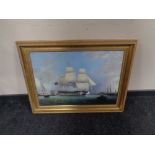 A pair of gilt framed prints on canvas depicting ships