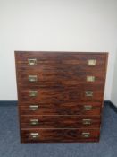 A mid 20th century six drawer chest with brass drop handles.