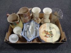 A box of antique and later pottery and china to include pottery jugs, commemorative mugs,