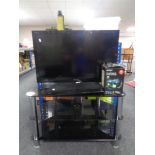 A Sony Bravia ADL-32 EX 732 TV with remote, Sony Blu Ray disc player with remote,