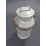 A 20th century aluminium churn with lid, height 70 cm.