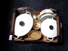 A box containing Pyrex dishes with lids, two Le Creuset cast iron cooking pots with lids etc.