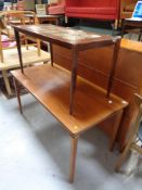 A mid 20th century teak coffee table together with a further tile top coffee table.