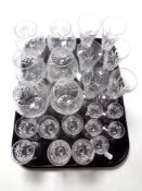 A tray of assorted lead crystal drinking glasses