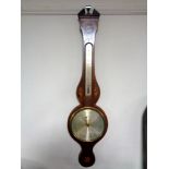 An antique inlaid mahogany banjo barometer with silver dial by L. Ganna.