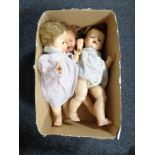 A box of three mid 20th century plastic dolls