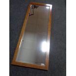 A walnut framed Art Deco bevel edged hall mirror.