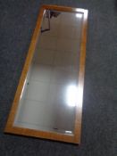 A walnut framed Art Deco bevel edged hall mirror.