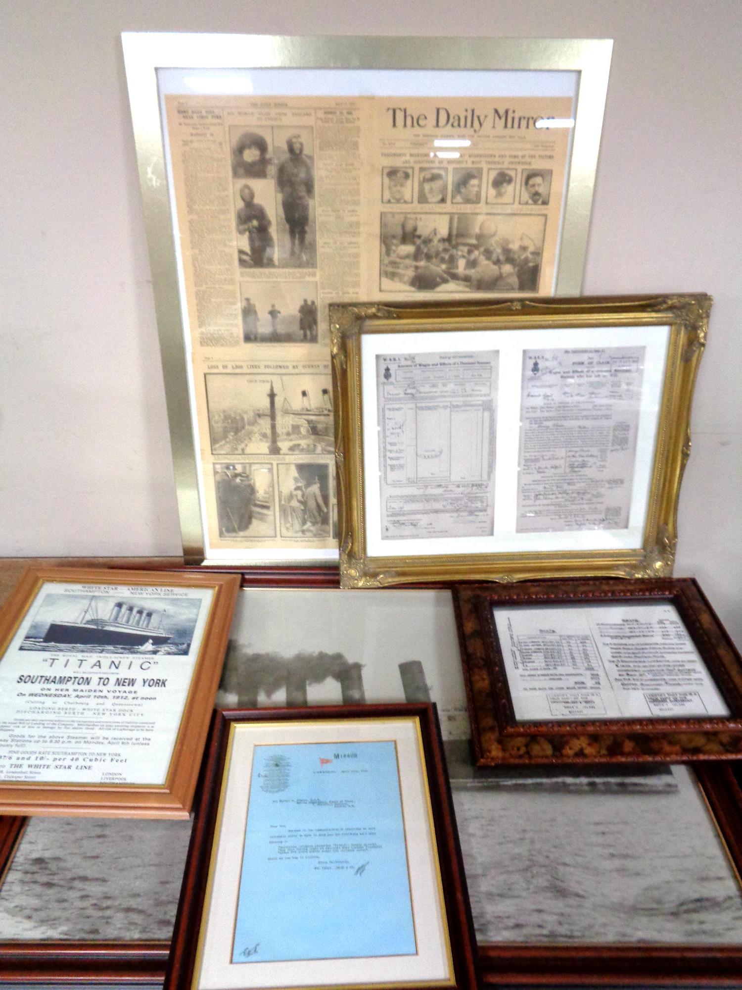 A framed copy of the Daily Mirror reporting the sinking of Titanic together with five other framed