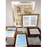 A framed copy of the Daily Mirror reporting the sinking of Titanic together with five other framed
