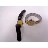 A gent's vintage 9ct gold cushion shaped wristwatch,
