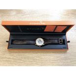 A gent's stainless steel Stuhrling automatic wristwatch with visible movement, boxed.