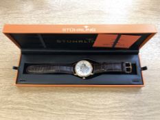 A gent's stainless steel Stuhrling automatic wristwatch with visible movement, boxed.