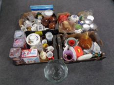Four boxes containing miscellaneous to include tins, storage jars, tea cups, figurine,