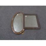 A 19th century carved framed wall mirror together with a further oval framed bevel edged mirror.