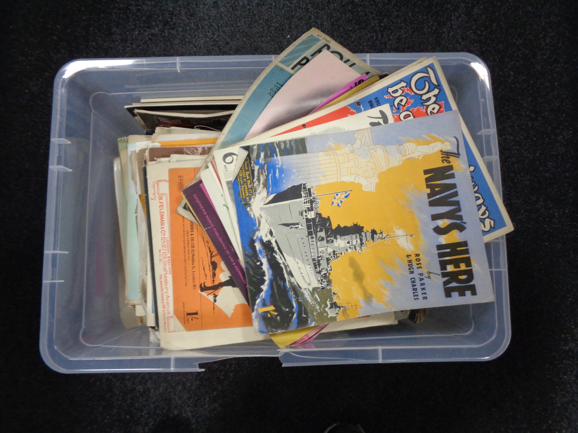 A box of assorted sheet music