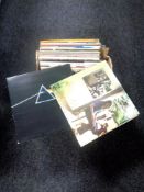 A box of vinyl LP records - Pink Floyd, Super Tramp, Steve Miller band,