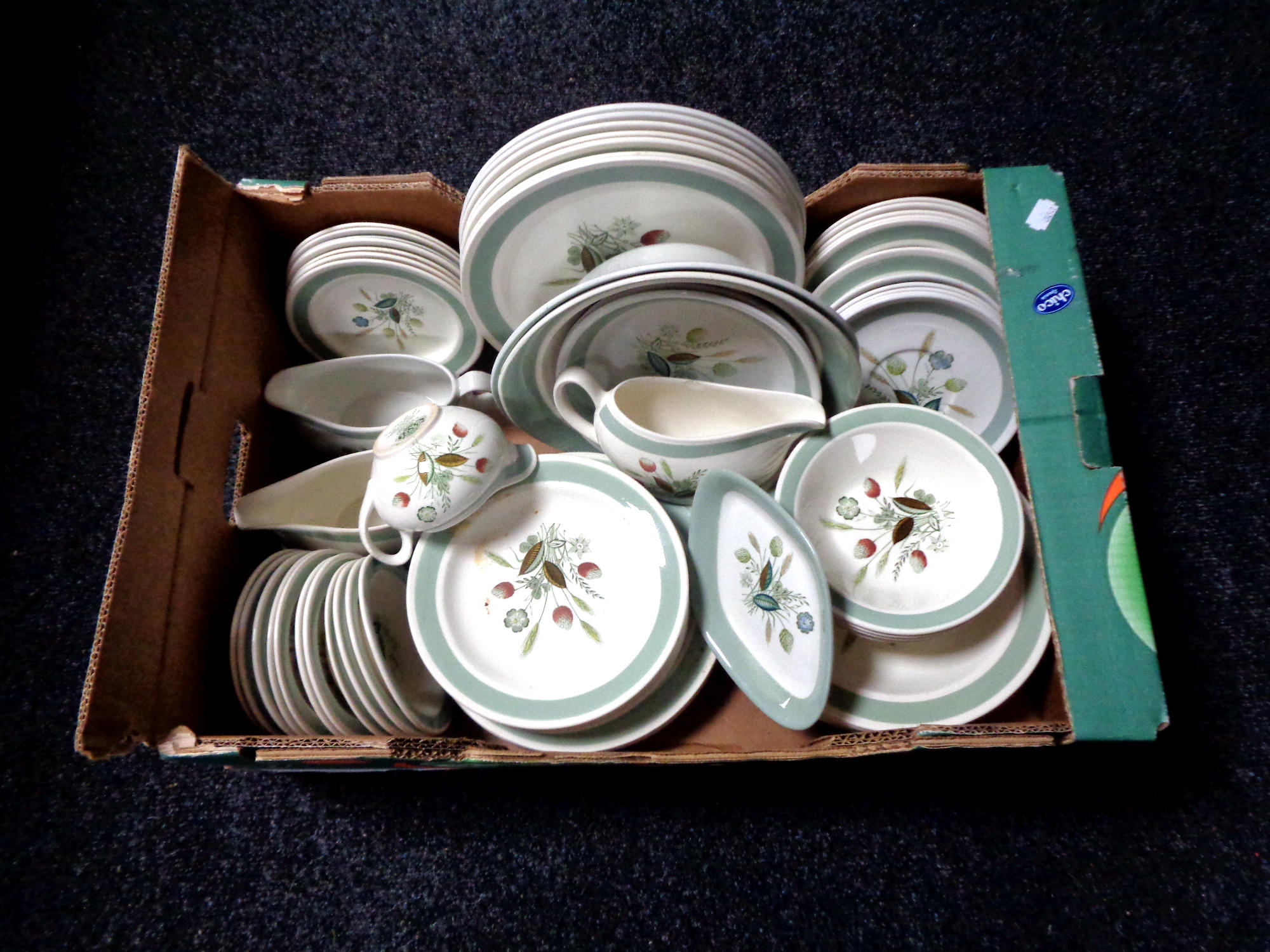 A box containing a quantity of Woods and Son Clovelly dinnerware.