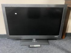 A Bush 40'' LCD TV with remote.