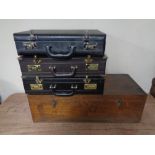 Three leather briefcases and a wooden Dudley electric vacuum cleaner box (empty)