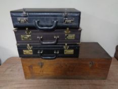 Three leather briefcases and a wooden Dudley electric vacuum cleaner box (empty)