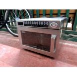 A Samsung CM1929 1850W stainless steel commercial microwave