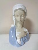 A Lladro figure of the Madonna.