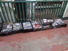 Seven crates and boxes of assorted DVD's and CD's