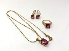 A 14ct gold dress ring set with synthetic sapphire together with matching pendant on chain and pair