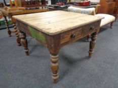 A 19th century pine kitchen table, fitted two drawers.