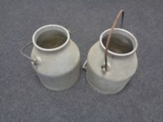 A pair of 20th century aluminium churns