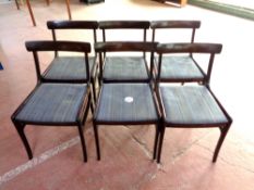 A set of six mid 20th century Danish dining chairs upholstered in a striped fabric