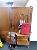 A contemporary floor lamp together with a 20th century two tier trolley,