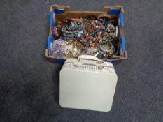 A box and two further cases containing a large quantity of assorted costume jewellery and lipsticks.