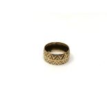 A 9ct gold textured band ring, 4.