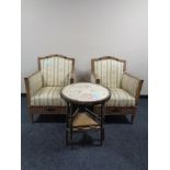 A pair of 20th century wicker armchairs upholstered in a Regency striped fabric together with a