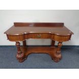 A Victorian mahogany Duchess style dressing table